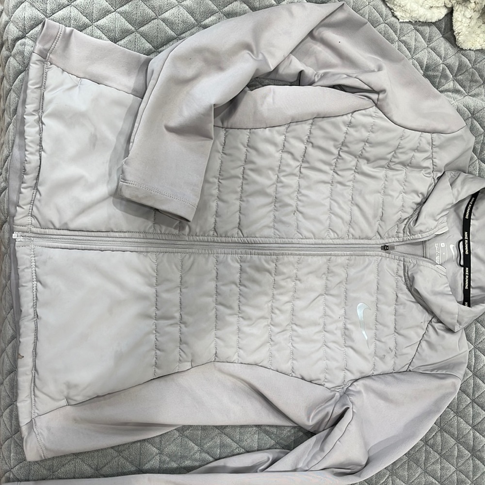Nike puffer jacket. Fits true to size.
